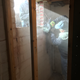 Cutting the wall with a massive saw.